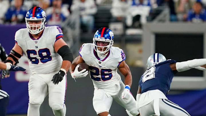New York Giants running back Saquon Barkley (26) rushese against the Dallas Cowboys in the first