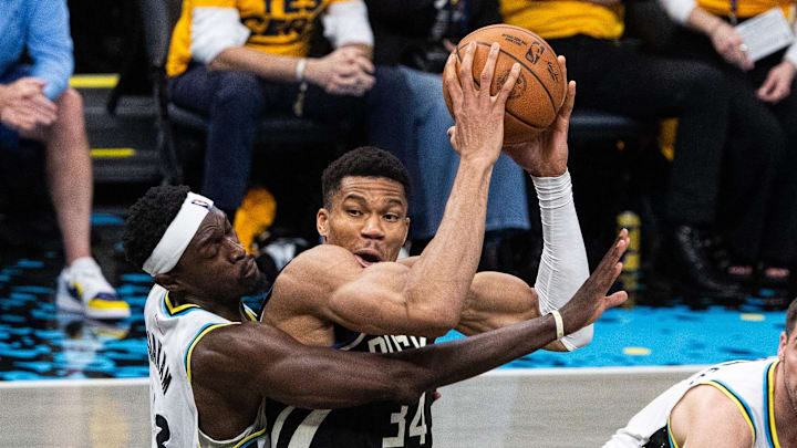 Apr 29, 2025; Indianapolis, Indiana, USA; Milwaukee Bucks forward Giannis Antetokounmpo (34) shoots the ball while Indiana Pacers forward Pascal Siakam (43)  defends during game five of the first round for the 2024 NBA Playoffs at Gainbridge Fieldhouse. Mandatory Credit: Trevor Ruszkowski-Imagn Images