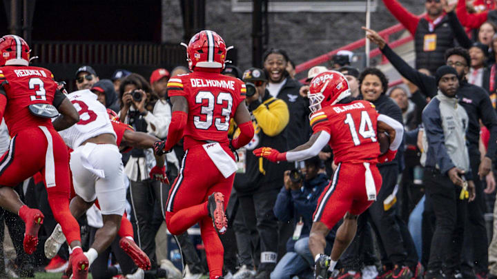 Nov 1, 2025; College Park, Maryland, USA; Maryland Terrapins defensive back Jamare Glasker (14) returns a first quarter interception against the Indiana Hoosiers at SECU Stadium. Mandatory Credit: Tommy Gilligan-Imagn Images Nov 1, 2025; College Park, Maryland, USA; Maryland Terrapins defensive back Jamare Glasker (14) returns a first quarter interception against the Indiana Hoosiers at SECU Stadium. Mandatory Credit: Tommy Gilligan-Imagn Images