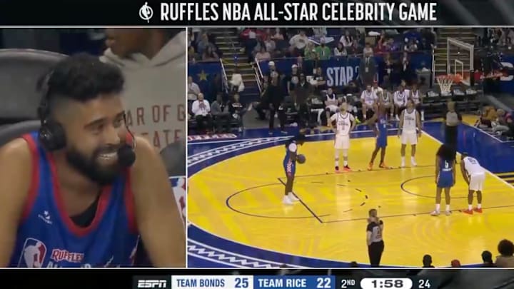 AP Dhillon reacts to dropping an F-bomb during the NBA All-Star celebrity game.