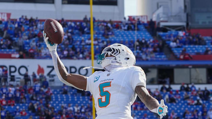 Miami Dolphins cornerback Jalen Ramsey (5) warms up prior to the game at Highmark Stadium.