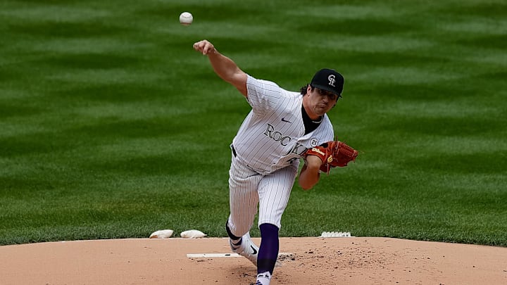 Sep 15, 2024; Denver, Colorado, USA; Colorado Rockies starting pitcher Cal Quantrill (47) pitches in the first inning against the Chicago Cubs at Coors Field.