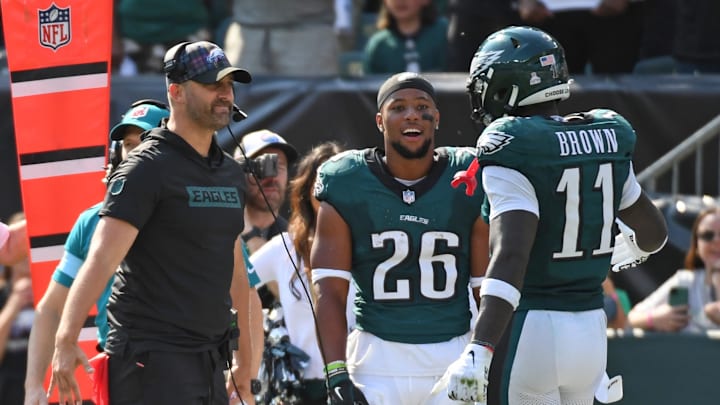 Oct 13, 2024; Philadelphia, Pennsylvania, USA; Philadelphia Eagles head coach Nick Sirianni and running back Saquon Barkley (26) celebrate touchdown catch by wide receiver A.J. Brown (11) against the Cleveland Browns during the second quarter at Lincoln Financial Field. Mandatory Credit: Eric Hartline-Imagn Images