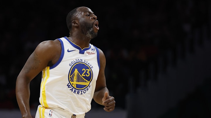 Feb 27, 2024; Washington, District of Columbia, USA; Golden State Warriors forward Draymond Green (23) reacts after making a three point field goal against the Washington Wizards in the first half at Capital One Arena. Mandatory Credit: Geoff Burke-Imagn Images