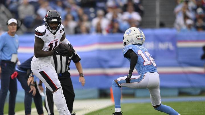 Oct 11, 2026; Nashville, Tennessee, USA; Houston Texans wide receiver Kayshon Boutte (14) makes a catch against Tennessee Titans cornerback Cor'Dale Flott (18) during the second quarter at Nissan Stadium. Mandatory Credit: Steve Roberts-Imagn Images Oct 11, 2026; Nashville, Tennessee, USA; Houston Texans wide receiver Kayshon Boutte (14) makes a catch against Tennessee Titans cornerback Cor'Dale Flott (18) during the second quarter at Nissan Stadium. Mandatory Credit: Steve Roberts-Imagn Images