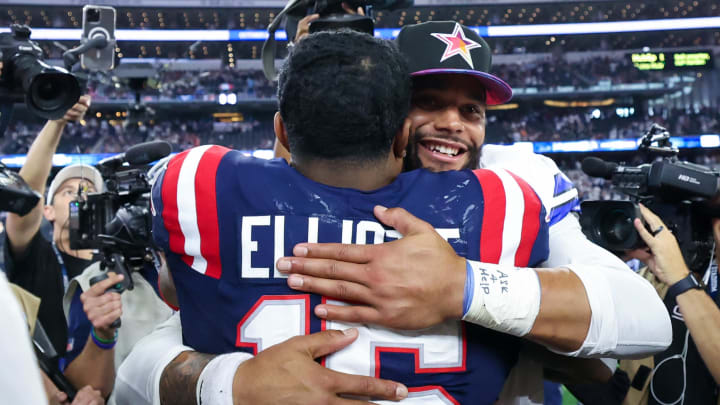 Oct 1, 2023; Arlington, Texas, USA;  Dallas Cowboys quarterback Dak Prescott (4) hugs New England