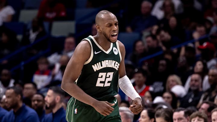 Mar 28, 2024; New Orleans, Louisiana, USA; Milwaukee Bucks forward Khris Middleton (22) reacts to making a basket against New Orleans Pelicans guard CJ McCollum (3) during the second half at Smoothie King Center. Mandatory Credit: Stephen Lew-Imagn Images Mar 28, 2024; New Orleans, Louisiana, USA; Milwaukee Bucks forward Khris Middleton (22) reacts to making a basket against New Orleans Pelicans guard CJ McCollum (3) during the second half at Smoothie King Center. Mandatory Credit: Stephen Lew-Imagn Images