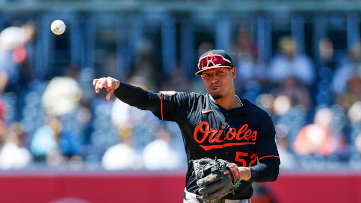 Sep 3, 2025; San Diego, California, USA; Baltimore Orioles shortstop Luis Vazquez (52) throws to first base for an out during the fourth inning against the San Diego Padres at Petco Park. Mandatory Credit: David Frerker-Imagn Images