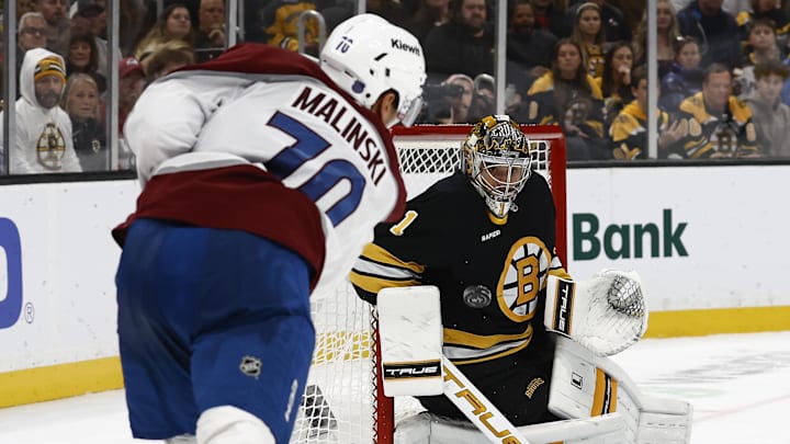 Oct 25, 2025; Boston, Massachusetts, USA; Boston Bruins goaltender Jeremy Swayman (1) eyes a shot by Colorado Avalanche defenseman Sam Malinski (70) during the third period at TD Garden. Mandatory Credit: Winslow Townson-Imagn Images Oct 25, 2025; Boston, Massachusetts, USA; Boston Bruins goaltender Jeremy Swayman (1) eyes a shot by Colorado Avalanche defenseman Sam Malinski (70) during the third period at TD Garden. Mandatory Credit: Winslow Townson-Imagn Images