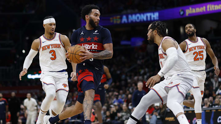 Dec 28, 2024; Washington, District of Columbia, USA; Washington Wizards forward Justin Champagnie (9) drives to the basket as New York Knicks guard Jalen Brunson (11) defends in the fourth quarter at Capital One Arena. Mandatory Credit: Geoff Burke-Imagn Images