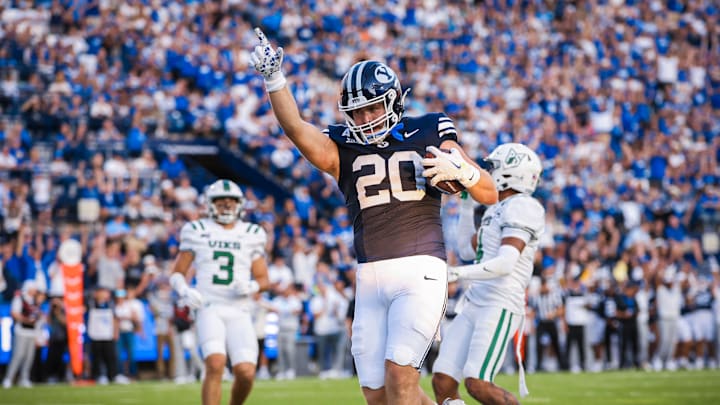 Carsen Ryan scores a touchdown against Portland State