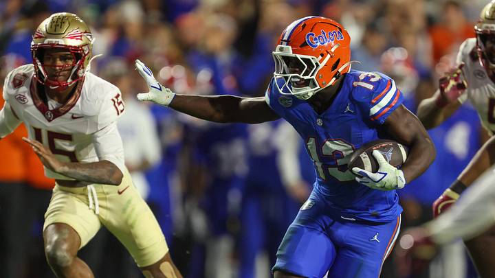 Florida running back Jadan Baugh (13) runs during the second half of an NCAA football game at Steve Spurrier Field at Ben Hill Griffin Stadium in Gainesville, FL on Saturday, November 29, Florida beat Florida State 40-21.2025. [Alan Youngblood/Gainesville Sun]