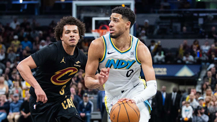 Apr 10, 2025; Indianapolis, Indiana, USA; Indiana Pacers guard Tyrese Haliburton (0) dribbles the ball while Cleveland Cavaliers guard Craig Porter Jr. (9) defends in the second half at Gainbridge Fieldhouse. Mandatory Credit: Trevor Ruszkowski-Imagn Images Apr 10, 2025; Indianapolis, Indiana, USA; Indiana Pacers guard Tyrese Haliburton (0) dribbles the ball while Cleveland Cavaliers guard Craig Porter Jr. (9) defends in the second half at Gainbridge Fieldhouse. Mandatory Credit: Trevor Ruszkowski-Imagn Images