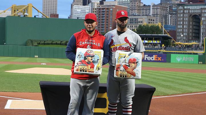 Oct 4, 2022; Pittsburgh, Pennsylvania, USA; St. Louis Cardinals catcher Yadier Molina (left) and designated hitter Albert Pujols (right) receive commemorative bases from the Pittsburgh Pirates in honor of their upcoming retirement from baseball before the game at PNC Park. Mandatory Credit: Charles LeClaire-USA TODAY Sports Oct 4, 2022; Pittsburgh, Pennsylvania, USA; St. Louis Cardinals catcher Yadier Molina (left) and designated hitter Albert Pujols (right) receive commemorative bases from the Pittsburgh Pirates in honor of their upcoming retirement from baseball before the game at PNC Park. Mandatory Credit: Charles LeClaire-USA TODAY Sports
