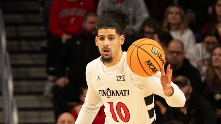 Cincinnati Bearcats guard Shon Abaev (10) handles the ball in the first half of the NCAA basketball game against the Lipscomb Bisons at Fifth Third Arena in Cincinnati on Dec. 29, 2025.