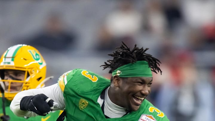 Jan 1, 2024; Glendale, AZ, USA; Oregon Ducks defensive end Brandon Dorlus (3) against the Liberty