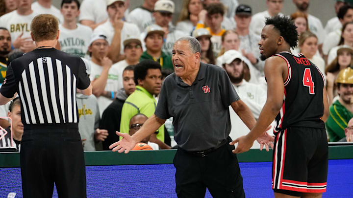 Houston coach Kelvin Sampson (center) and guard LJ Cryer (right) react to a call during the Cougars' win at Baylor on March 8, 2025.