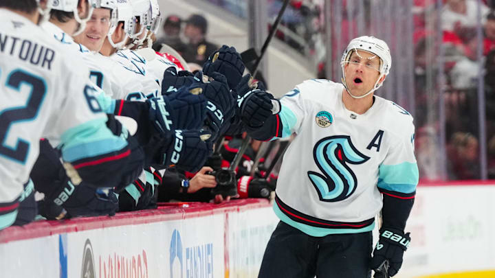 Dec 3, 2024; Raleigh, North Carolina, USA;  Seattle Kraken center Jaden Schwartz (17) celebrates his goal against the Carolina Hurricanes during the first period at Lenovo Center. Mandatory Credit: James Guillory-Imagn Images