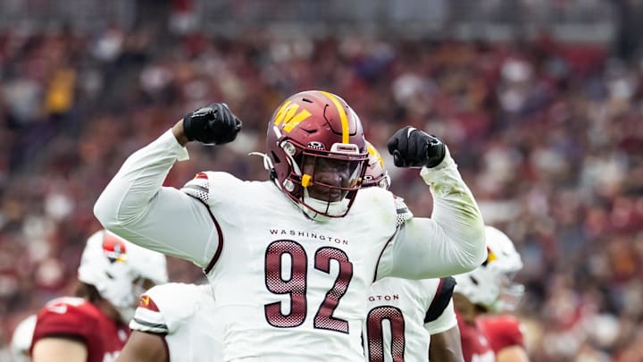 Sep 29, 2024; Glendale, Arizona, USA; Washington Commanders defensive end Dorance Armstrong (92) celebrates after sacking Arizona Cardinals quarterback Kyler Murray (not pictured) in the first half at State Farm Stadium. Mandatory Credit: Mark J. Rebilas-Imagn Images Sep 29, 2024; Glendale, Arizona, USA; Washington Commanders defensive end Dorance Armstrong (92) celebrates after sacking Arizona Cardinals quarterback Kyler Murray (not pictured) in the first half at State Farm Stadium. Mandatory Credit: Mark J. Rebilas-Imagn Images