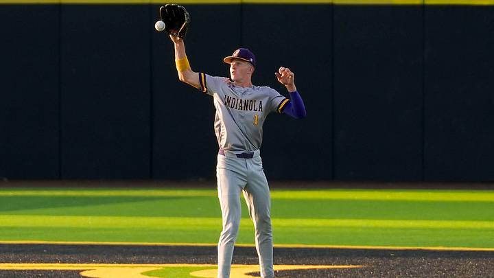 Indianola’s George Blake (1) fields a ball in center field during a regional final baseball game against Iowa City High July 16, 2025 at Duane Banks Field in Iowa City, Iowa. Indianola’s George Blake (1) fields a ball in center field during a regional final baseball game against Iowa City High July 16, 2025 at Duane Banks Field in Iowa City, Iowa.