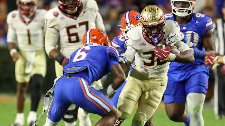 Florida cornerback J'Vari Flowers (6) chases down Florida State running back Ousmane Kromah (32) during the second half of an NCAA football game at Steve Spurrier Field at Ben Hill Griffin Stadium in Gainesville, FL on Saturday, November 29, Florida beat Florida State 40-21.2025. [Alan Youngblood/Gainesville Sun]