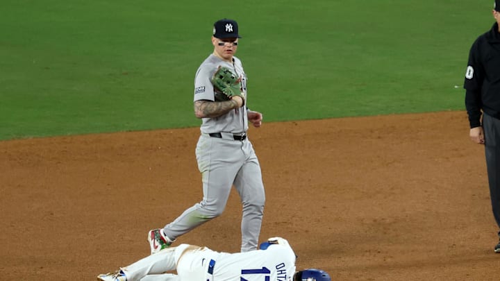 Oct 26, 2024; Los Angeles, California, USA; Los Angeles Dodgers designated hitter Shohei Ohtani (17) reacts after injuring his shoulder against the New York Yankees in the seventh inning for game two of the 2024 MLB World Series at Dodger Stadium. Mandatory Credit: Kiyoshi Mio-Imagn Images