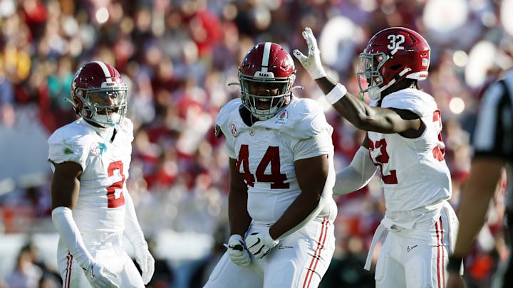 Jan 1, 2024; Pasadena, CA, USA; Alabama Crimson Tide defensive lineman Damon Payne Jr. (44) and linebacker Deontae Lawson (32) reacts after a play in the first quarter against the Michigan Wolverines in the 2024 Rose Bowl college football playoff semifinal game at Rose Bowl. Mandatory Credit: Kiyoshi Mio-Imagn Images