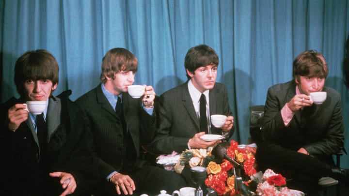 The Beatles drinking tea