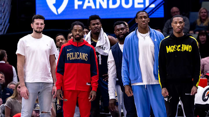 Jan 3, 2025; New Orleans, Louisiana, USA; New Orleans Pelicans forward Zion Williamson (1), center Yves Missi (21) and teammates watch from the bench during the first half against the Washington Wizards at Smoothie King Center. Mandatory Credit: Stephen Lew-Imagn Images Jan 3, 2025; New Orleans, Louisiana, USA; New Orleans Pelicans forward Zion Williamson (1), center Yves Missi (21) and teammates watch from the bench during the first half against the Washington Wizards at Smoothie King Center. Mandatory Credit: Stephen Lew-Imagn Images