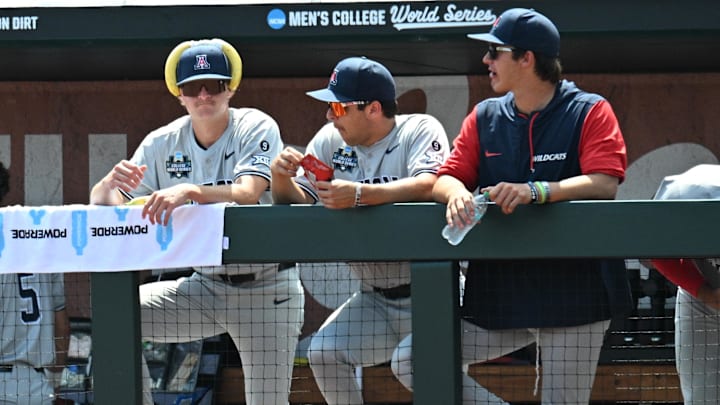 Jun 15, 2025; Omaha, Neb, USA;  Arizona Wildcats player wears bananas to rally the team against the Louisville Cardinals at Charles Schwab Field. Mandatory Credit: Steven Branscombe-Imagn Images