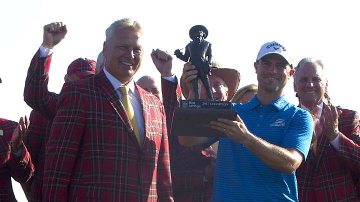 Apr 16, 2017; Hilton Head, SC, USA; Wesley Bryan celebrates on the eighteenth green after winning the RBC Heritage golf tournament at Harbour Town Golf Links. Mandatory Credit: Joshua S. Kelly-Imagn Images