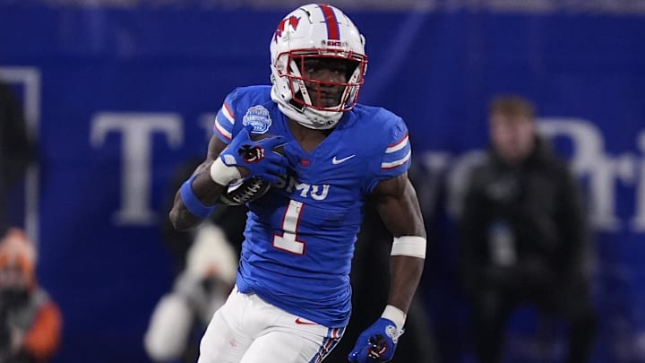 Dec 7, 2024; Charlotte, NC, USA; Southern Methodist Mustangs running back Brashard Smith (1) runs during the second quarter against the Clemson Tigers in the 2024 ACC Championship game at Bank of America Stadium. Mandatory Credit: Jim Dedmon-Imagn Images