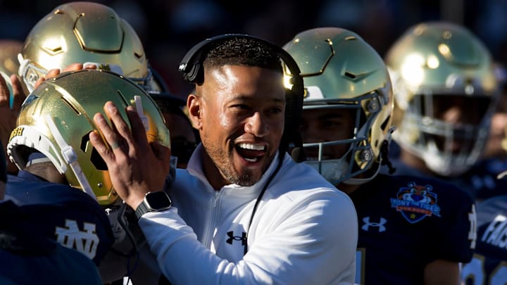 Notre Dame head football coach Marcus Freeman celebrates at the 90th annual Sun Bowl game