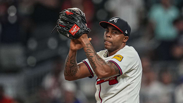 Sep 23, 2025; Cumberland, Georgia, USA; Atlanta Braves relief pitcher Raisel Iglesias (26)  reacts after the Braves defeated the Washington Nationals at Truist Park. Mandatory Credit: Dale Zanine-Imagn Images