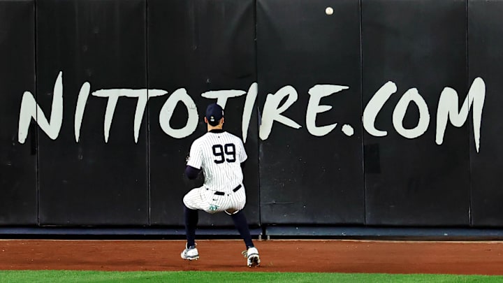 New York Yankees outfielder Aaron Judge (99) plays a ball off the wall hit by Los Angeles Dodgers outfielder Teoscar Hernandez (not pictured) during the fifth inning during game five of the 2024 MLB World Series at Yankee Stadium. New York Yankees outfielder Aaron Judge (99) plays a ball off the wall hit by Los Angeles Dodgers outfielder Teoscar Hernandez (not pictured) during the fifth inning during game five of the 2024 MLB World Series at Yankee Stadium.