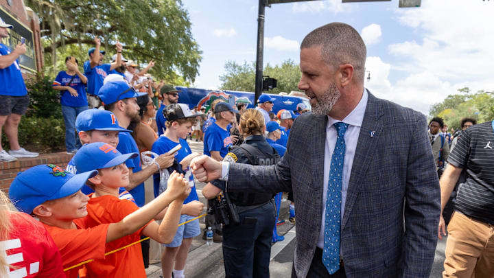 Florida head coach Billy Napier greets fans during gator walk before an NCAA football game against Texas in Gainesville, FL on Saturday, October 4, 2025. [Alan Youngblood/Gainesville Sun]