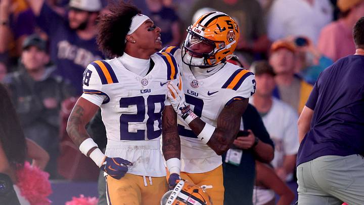 Oct 25, 2025; Baton Rouge, Louisiana, USA; Louisiana State Tigers safety Jhase Thomas (28) celebrates with cornerback DJ Pickett (3) after a play during the first half against the Texas A&M Aggies at Tiger Stadium. Mandatory Credit: Stephen Lew-Imagn Images Oct 25, 2025; Baton Rouge, Louisiana, USA; Louisiana State Tigers safety Jhase Thomas (28) celebrates with cornerback DJ Pickett (3) after a play during the first half against the Texas A&M Aggies at Tiger Stadium. Mandatory Credit: Stephen Lew-Imagn Images