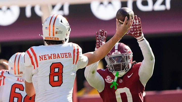 Nov 16, 2024; Tuscaloosa, AL, USA; Alabama Crimson Tide linebacker Deontae Lawson (0) deflects a pass from Mercer quarterback Whitt Newbauer (8) that was intercepted by Alabama at Bryant-Denny Stadium. Mandatory Credit: Gary Cosby Jr.-Tuscaloosa News