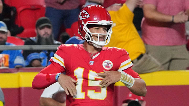 Oct 12, 2025; Kansas City, Missouri, USA; Kansas City Chiefs quarterback Patrick Mahomes (15) reacts after a touchdown against the Detroit Lions during the first half at GEHA Field at Arrowhead Stadium. Mandatory Credit: Denny Medley-Imagn Images