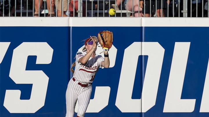 May 30, 2026; Oklahoma City, OK, USA; Alabama Crimson Tide outfielder Larissa Preuitt (11) makes a catch for an out in the fifth inning against the Alabama Crimson Tide during the NCAA Women’s College World Series at Devon Park. Mandatory Credit: Brett Rojo-Imagn Images May 30, 2026; Oklahoma City, OK, USA; Alabama Crimson Tide outfielder Larissa Preuitt (11) makes a catch for an out in the fifth inning against the Alabama Crimson Tide during the NCAA Women’s College World Series at Devon Park. Mandatory Credit: Brett Rojo-Imagn Images