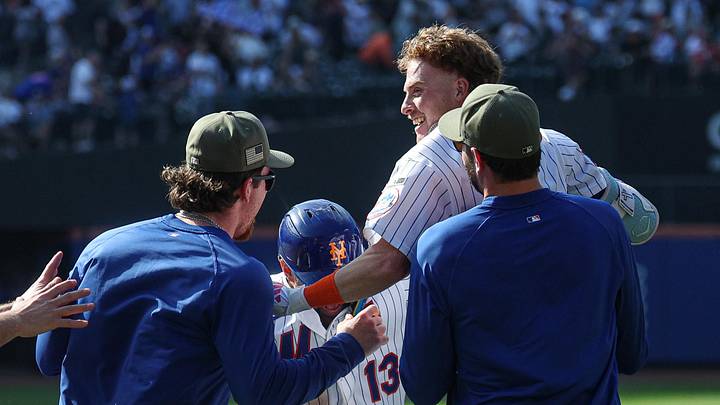 Mets right fielder Carson Benge (3) celebrates with teammates after defeating the Yankees in ten innings at Citi Field. Mets right fielder Carson Benge (3) celebrates with teammates after defeating the Yankees in ten innings at Citi Field.