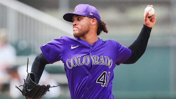 Colorado Rockies pitcher Luis Peralta (41) throws during a spring training game against the Minnesota Twins at Lee Health Sports Complex in Fort Myers, Fla., on Tuesday, March 25, 2025.