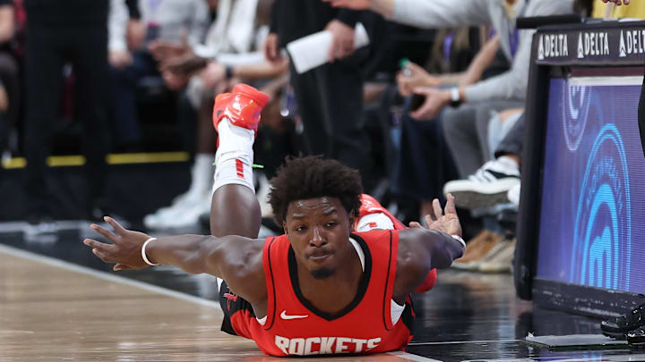 Oct 7, 2024; Salt Lake City, Utah, USA; Houston Rockets forward Jae'Sean Tate (8) dives for a ball against the Utah Jazz during the third quarter at Delta Center. Mandatory Credit: Rob Gray-Imagn Images Oct 7, 2024; Salt Lake City, Utah, USA; Houston Rockets forward Jae'Sean Tate (8) dives for a ball against the Utah Jazz during the third quarter at Delta Center. Mandatory Credit: Rob Gray-Imagn Images
