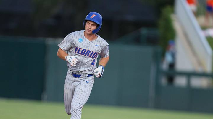 Florida infielder Cade Kurland (4) rounds second after hitting a grand slam during the 2026 NCAA Baseball Championship Gainesville Regional championship baseball game at Condron Family Ballpark in Gainesville, FL on Sunday, May 31, 2026. [Alan Youngblood/Gainesville Sun]
