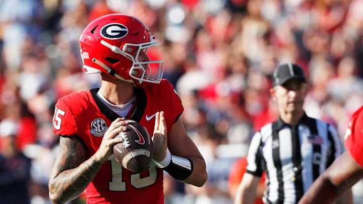 Georgia quarterback Carson Beck (15) looks to throw a pass during the first half of a NCAA college football game against Auburn in Athens, Ga., on Saturday, Oct. 5, 2024.
