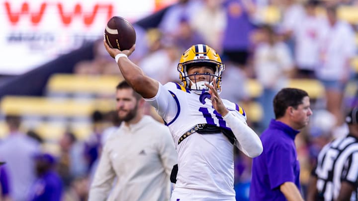Sep 28, 2024; Baton Rouge, Louisiana, USA;  LSU Tigers quarterback Colin Hurley (16) during warmups before a game against the South Alabama Jaguars at Tiger Stadium. Mandatory Credit: Stephen Lew-Imagn Images