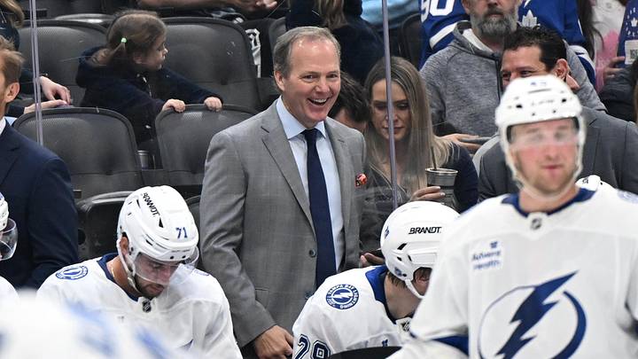 Mar 7, 2026; Toronto, Ontario, CAN; Tampa Bay Lightning head coach Jon Cooper enjoys a light moment on the bench during a time out against the Toronto Maple Leafs in the second period at Scotiabank Arena. Mandatory Credit: Dan Hamilton-Imagn Images Mar 7, 2026; Toronto, Ontario, CAN; Tampa Bay Lightning head coach Jon Cooper enjoys a light moment on the bench during a time out against the Toronto Maple Leafs in the second period at Scotiabank Arena. Mandatory Credit: Dan Hamilton-Imagn Images