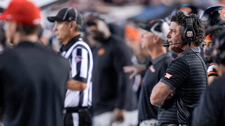 Oklahoma State head coach Mike Gundy stands on the sidelines in the third quarter during an NCAA football game between Oklahoma State (OSU) and Tulsa at Boone Pickens Stadium in Stillwater, Okla., on Friday, Sept. 19, 2025.