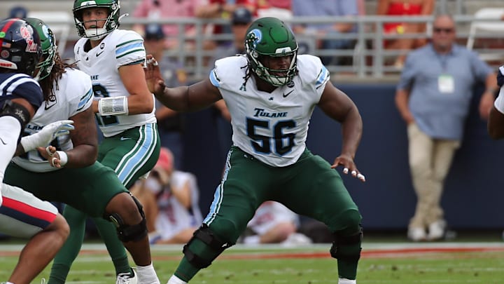 Sep 20, 2025; Oxford, Mississippi, USA; Tulane Green Wave offensive linemen Shadre Hurst (56) blocks during the first quarter against the Mississippi Rebels at Vaught-Hemingway Stadium. Mandatory Credit: Petre Thomas-Imagn Images