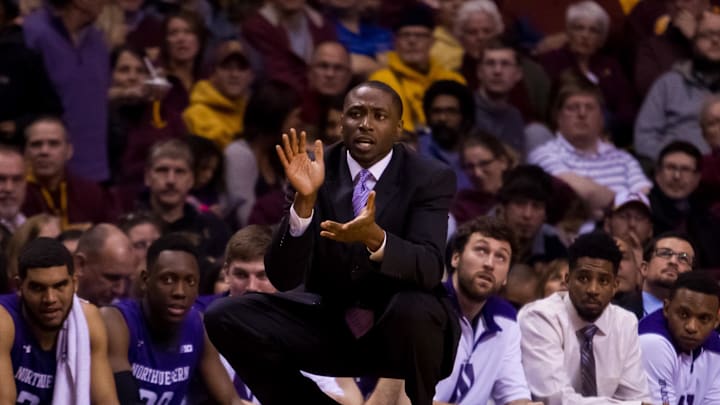 Feb 18, 2015; Minneapolis, MN, USA; Northwestern Wildcats assistant coach Armon Gates claps in the second half against the Minnesota Gophers at Williams Arena. The Northwestern Wildcats beat the Minnesota Gophers 72-66. Mandatory Credit: Brad Rempel-Imagn Images